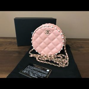 Chanel quilted pearl around round bag